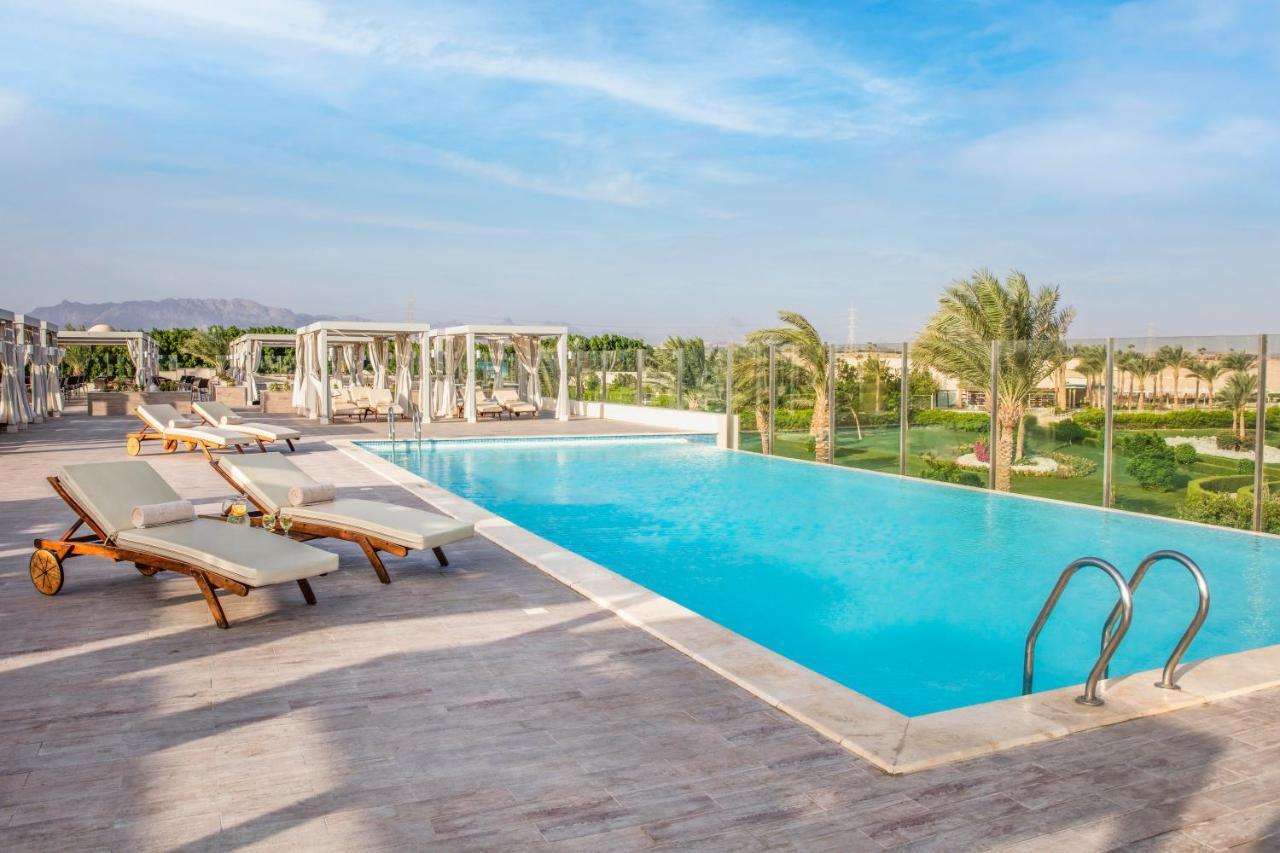 Hotel Jaz Aquaviva Hurghada Esterno foto The swimming pool at the hotel